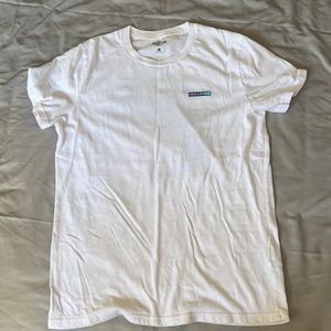 Medium white hollister shirt with blue wave on back of shirt